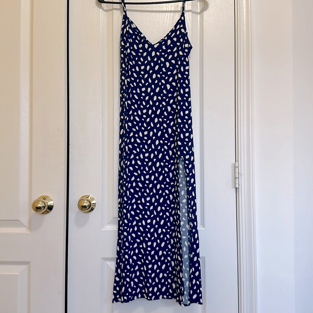 Blue Reformation midi dress, with a fun side slit. Straps are adjustable.